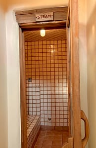 Steam Room at the Southwest Sanctuary – a beautifully tiled steam room offering relaxation and rejuvenation. Perfect for unwinding after a day of healing practices and self-care.