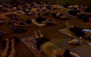 photo of people participating in end of the day group healing sessions
