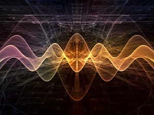 Digital artwork depicting intertwined sound waves in radiant orange and yellow tones, emanating from a central bright source against a complex, dark abstract background, symbolizing energy and vibration.