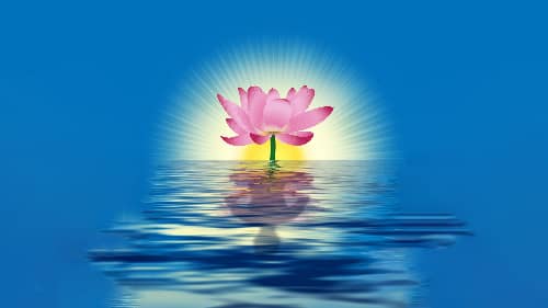 Serene pink lotus flower glowing with radiant light, floating on calm blue water with its reflection, symbolizing purity, enlightenment, and tranquility.
